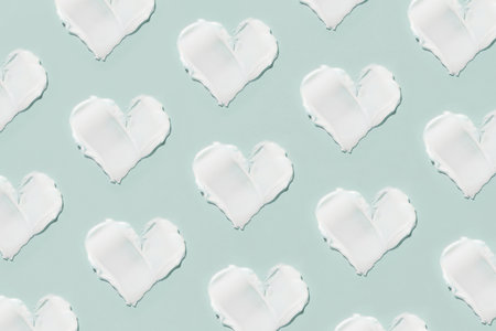Smears of cosmetic cream on a blue background