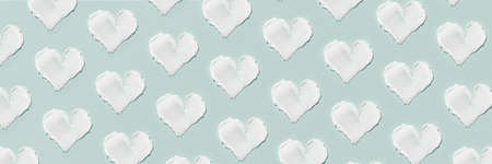 Smears of cosmetic cream on a blue backgroundの写真素材