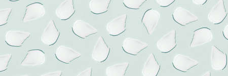 Smears of cream on a blue background.の写真素材