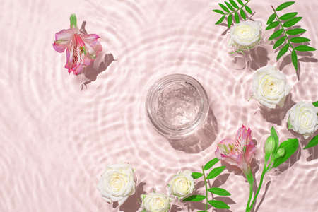 Jar of hydrating gel and flowers.