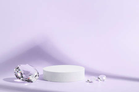 White podium with diamonds on a lilac background.の写真素材