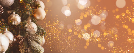 Silver Christmas balls on a fir branch.の写真素材