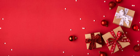 Christmas gift boxes with red balls.