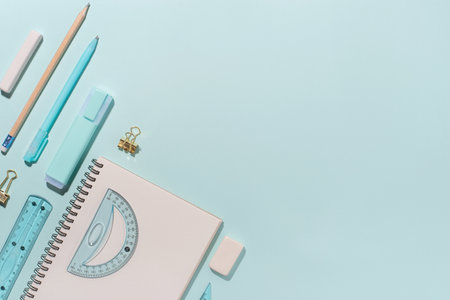 school supplies on blue background. Back to school concept. top view. copyspace.の写真素材