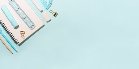 school supplies on blue background. Back to school concept. top view. copyspace.の写真素材