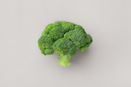 Fresh broccoli on a gray background. Top view. World Vegan Day concept.の写真素材