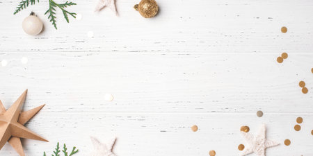 Festive Christmas background with Christmas decorations on white wooden table. Top view. Copy space for text.の写真素材