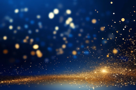Golden abstract bokeh on blue background. Celebrating Christmas, New Year or other holidays.の素材