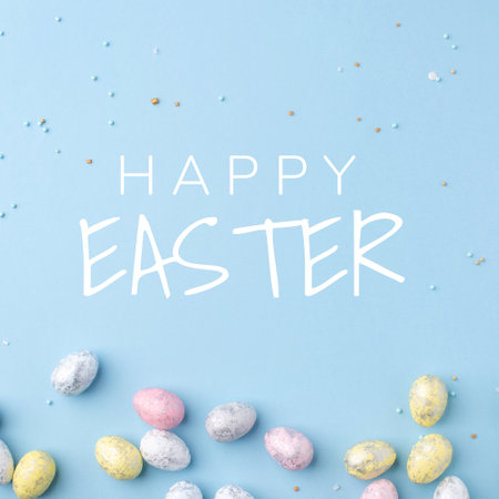 Festive Easter card. Multicolored Easter eggs on a blue background.の写真素材