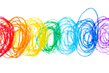 A photo of a rainbow drawn with colored pencils is highlighted on a white background.の写真素材