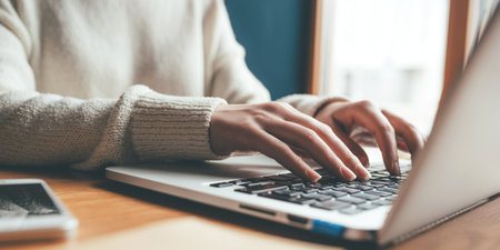 Young woman working in home on her laptop computer.の写真素材