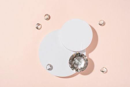 White podium with diamonds on a pink background.の写真素材