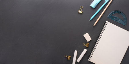 School supplies on black background. Back to school concept. Top view. Copy space.の写真素材