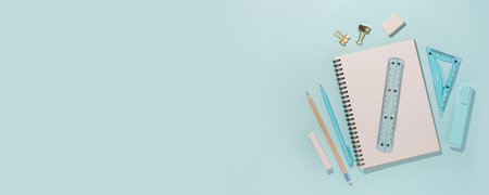School supplies on blue background. Back to school concept. Top view. Copy space.の写真素材