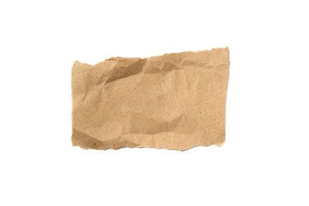 A torn piece of craft paper on a white backgroundの写真素材