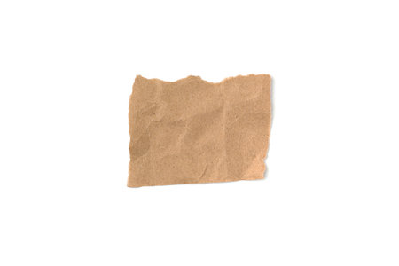 A torn piece of craft paper on a white backgroundの写真素材