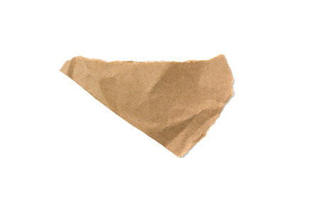 A torn piece of craft paper on a white backgroundの写真素材