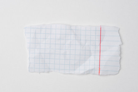 A torn piece of craft paper on a white backgroundの写真素材
