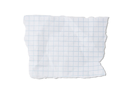 A torn piece of craft paper isolated on a white background. Perfect for eco-friendly designs and art projectsの写真素材