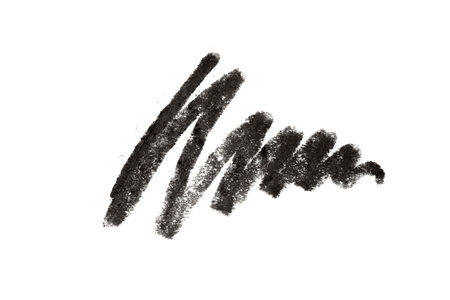 Black cosmetic eye pencil stroke isolated on white backgroundの写真素材