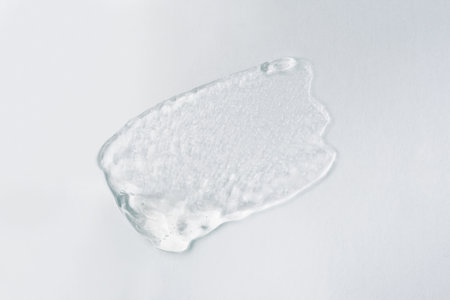 Transparent gel texture on a white background.の写真素材