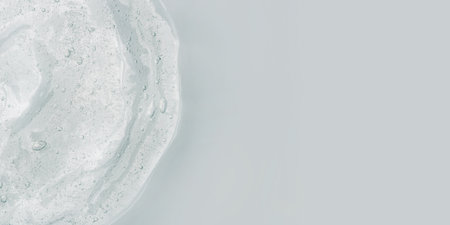 Transparent gel texture on a white background.の写真素材