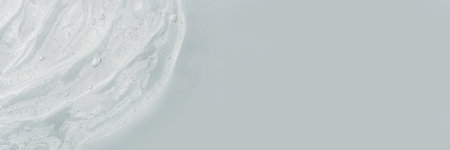 Transparent gel texture on a white background.