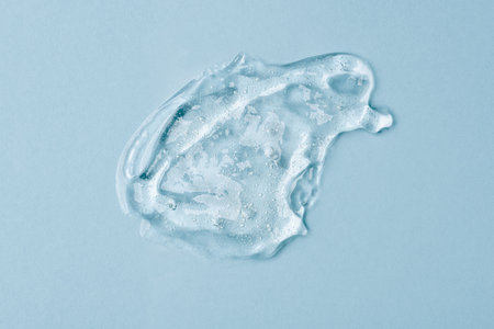 Transparent Skin care Product Smear on Blue Background