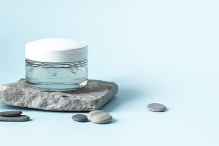 Transparent Skincare Product with Bubbles on Minimalist Background for Beauty and Wellness Conceptの写真素材
