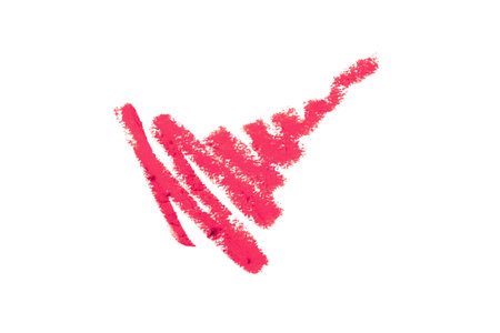 Red lip liner stroke isolated on white backgroundの写真素材