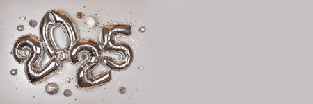 2025 Silver Balloon Numbers with Holiday Decorationsの写真素材