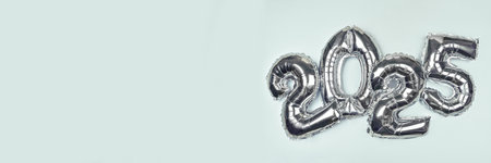 2025 Silver Balloon Numbers on blue background