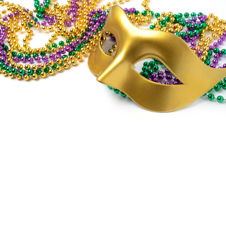 Mardi gras beads and mask isolated on white backgroundの写真素材