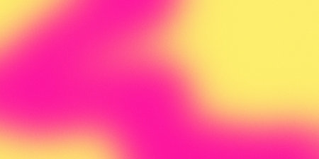 A vibrant gradient background with vibrant pink and yellow hues blending seamlessly into each other. A design with a subtle noise texture that adds depth and visual interest.の写真素材