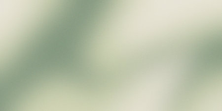 Soft gradient background in light green and beige tones with a subtle noise texture. Ideal for natural, minimalist, and organic design themesの写真素材