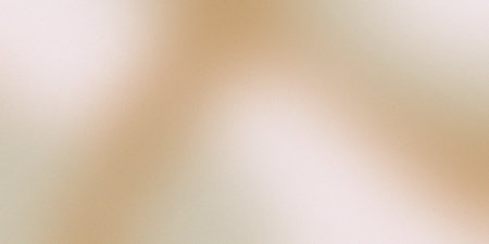 Gradient background with a textured noise effect in neutral beige and natural earthy tones.の写真素材