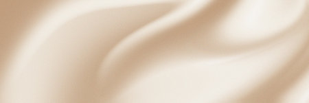 Gradient background with a textured noise effect in neutral beige and natural earthy tones.の写真素材