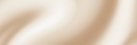Gradient background with a textured noise effect in neutral beige and natural earthy tones.の写真素材
