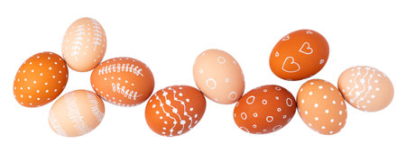 Natural brown Easter eggs with white minimalist patterns (hearts, dots, and lines) isolated on a white backgroundの写真素材