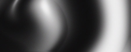 Abstract black and white background with a grainy texture. Perfect for banners, posters, headlines and covers.の写真素材