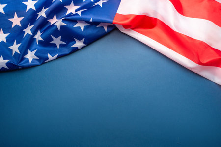 Blue background with American flag. Independence day. Website banner and greeting card design template.の写真素材