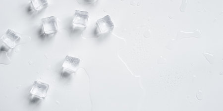 Melting ice cubes on a white backgroundの写真素材