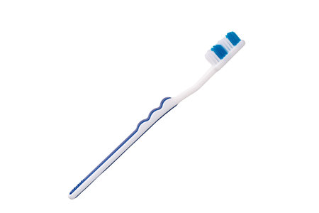 Blue toothbrush isolated on a white backgroundの写真素材