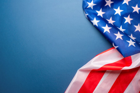 Blue background with American flag. Independence day. Website banner and greeting card design template.の写真素材