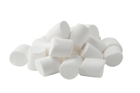 A pile of white marshmallows isolated on a white backgroundの写真素材