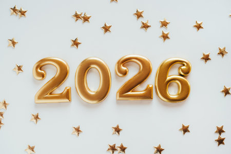 Metal numbers 2026 on a white table. Happy New Year 2026 is coming concept.