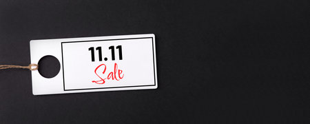 11.11 single day sale concept. White tag on black backgroundの写真素材