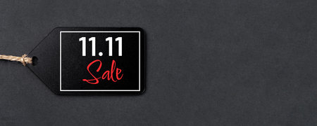 11.11 single day sale concept. Black tag on black backgroundの写真素材