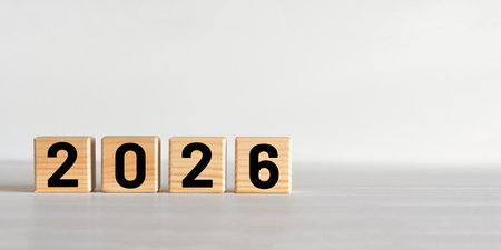 Wooden cubes with numbers of 2026 on the white background. New Year's cardの写真素材