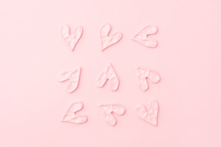 Valentine's day concept. Pink hearts on pink background.の写真素材